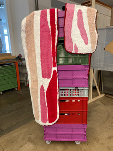Bacon rugs hanging to dry
